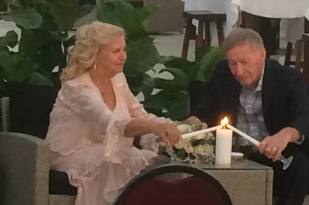 Former Senior Christian singles light candles together