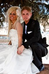 Alberta Christian single hugs his lovely wife