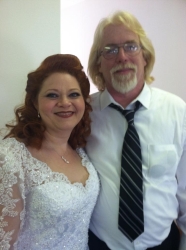 An encouraged Christian single woman stands next to a man and radiates joy