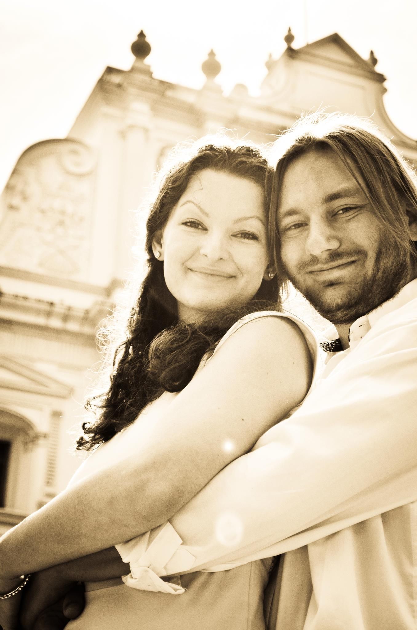 Former Christian single hugs his wife