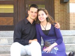 Christian singles sitting together and looking very comfortable while seated on steps