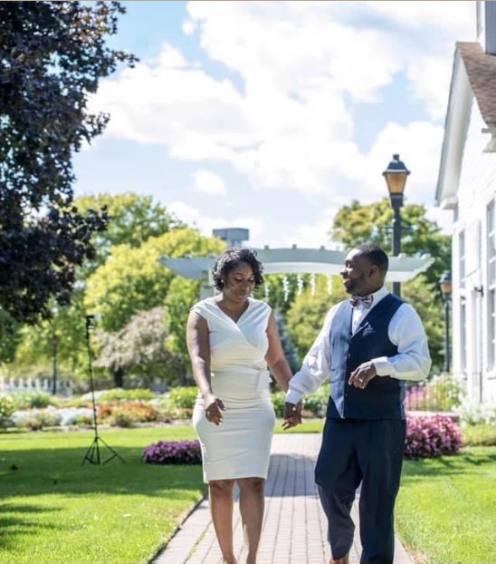 Christian newlyweds holding hands