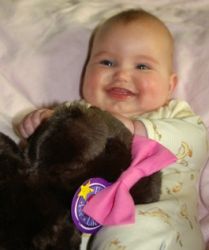 Beautiful baby hugs dog and wins first prize