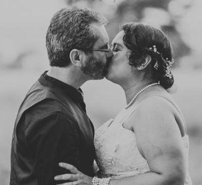 Finally married couple kissing passionately at wedding