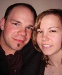 Two Christian singles from Alberta pose together cheek to cheek