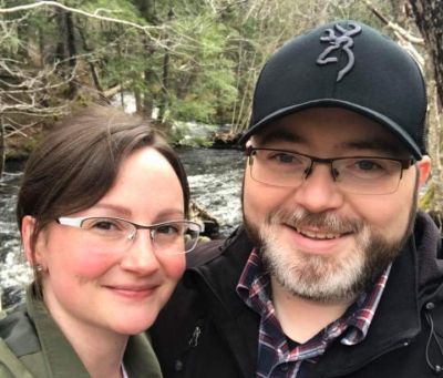 Beautiful Christian couple celebrates 10th anniversary with nature walk near rapids