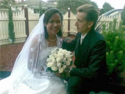 Australian man overcome with love only has eyes for her as she smiles while seated