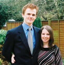 English Christian singles pose in the garden looking very happy together