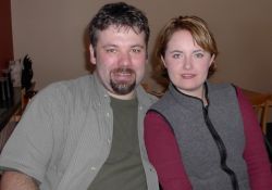 Cute Canadian Christian singles look very comfortable together on the couch