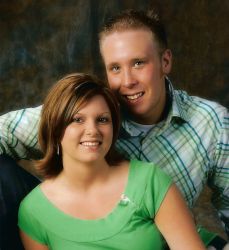 A cute Christian couple pose together for a photo shoot