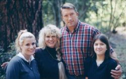 Blended Christian family on a hike in the forest