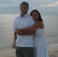 Northwestern Christian couple hug on beach
