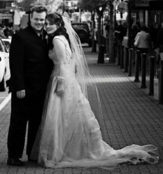 New Zealand wedding for this couple who smile while leaning in close on their wedding day