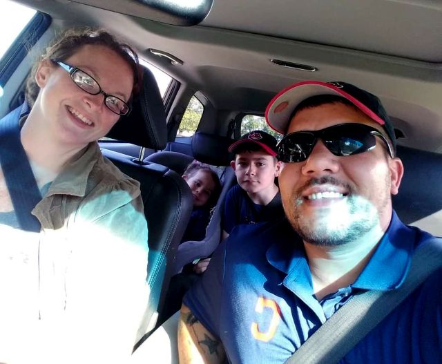 Family selfie in car