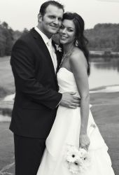 Former Christian singles in love smile while embracing
