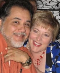 Texas Chaplain finds love online and is shown leaning close to a smiling pretty woman