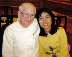 Very happy man shown hugging his late wife