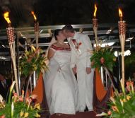 Kiss at the altar surrounded by flames