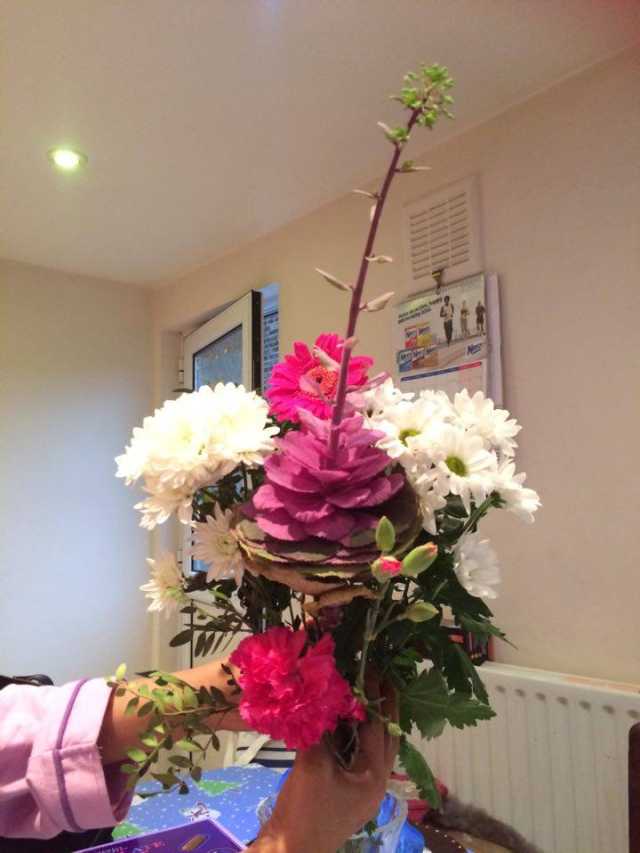 A beautiful bouquet with white hydrangea flowers in an office