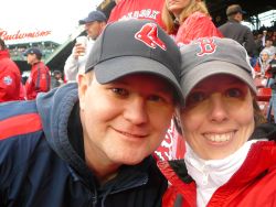 A happy couple at a Red Sox game
