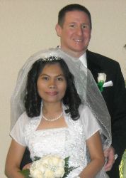 Christian couple smiling while standing