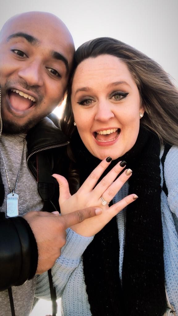 A Christian couple burst with excitement as they show off her engagement ring