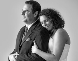 Former Christian single woman from Wisconsin looks calm as she hugs her husband