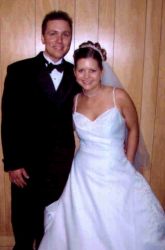 Born again Bible Believing Christians smile together on their wedding day