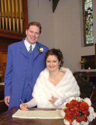 Signing wedding license on their wedding day